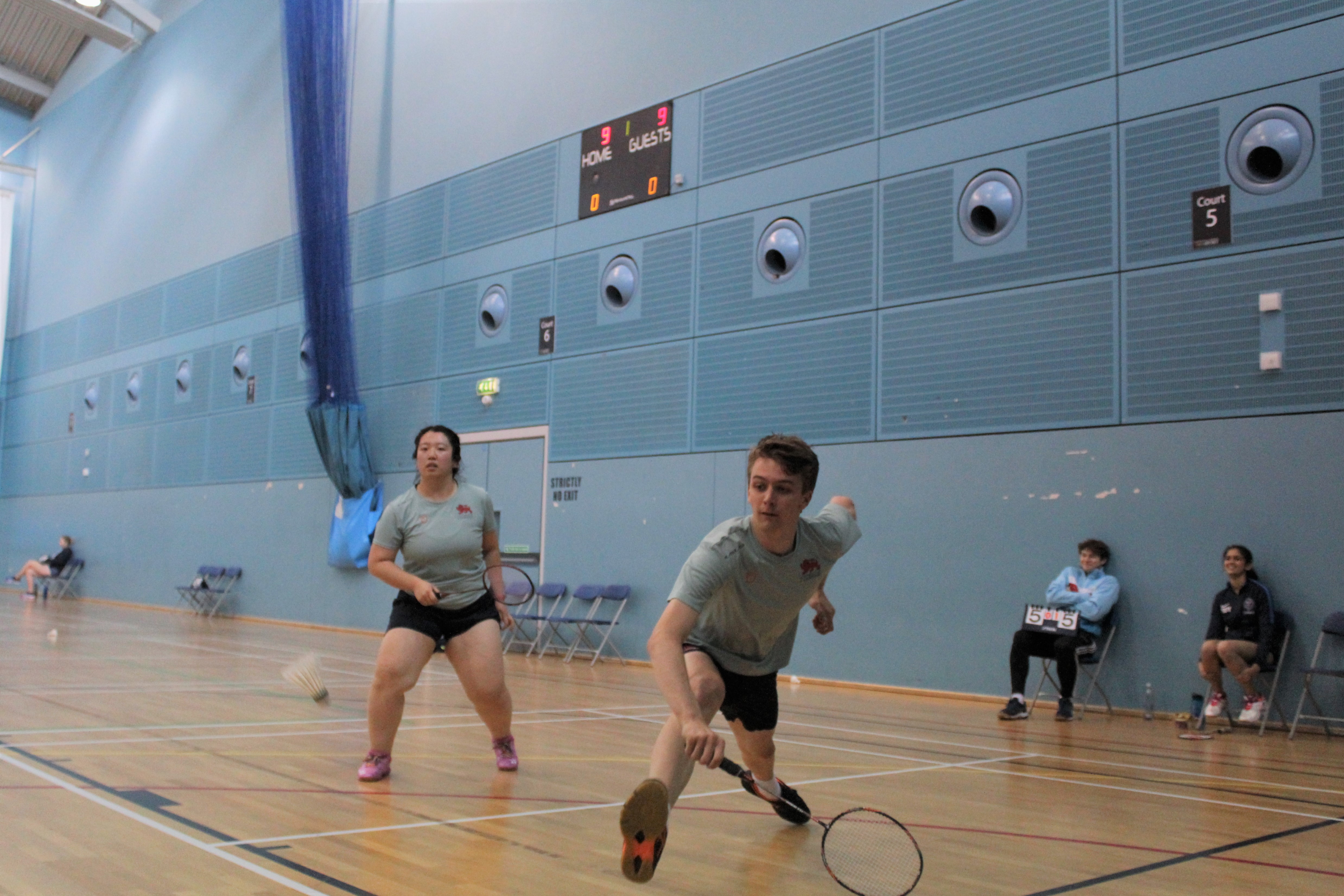 Amy and George at full stretch during their mixed doubles, coming short 25-23 in the third end